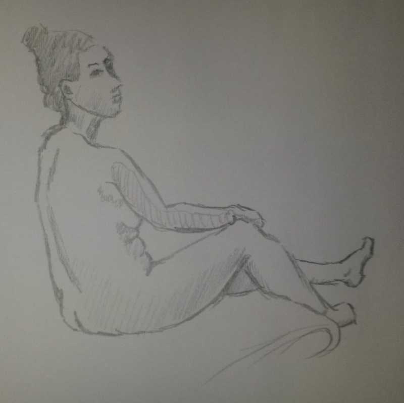 Woman, 2 of 5, seated, profile
